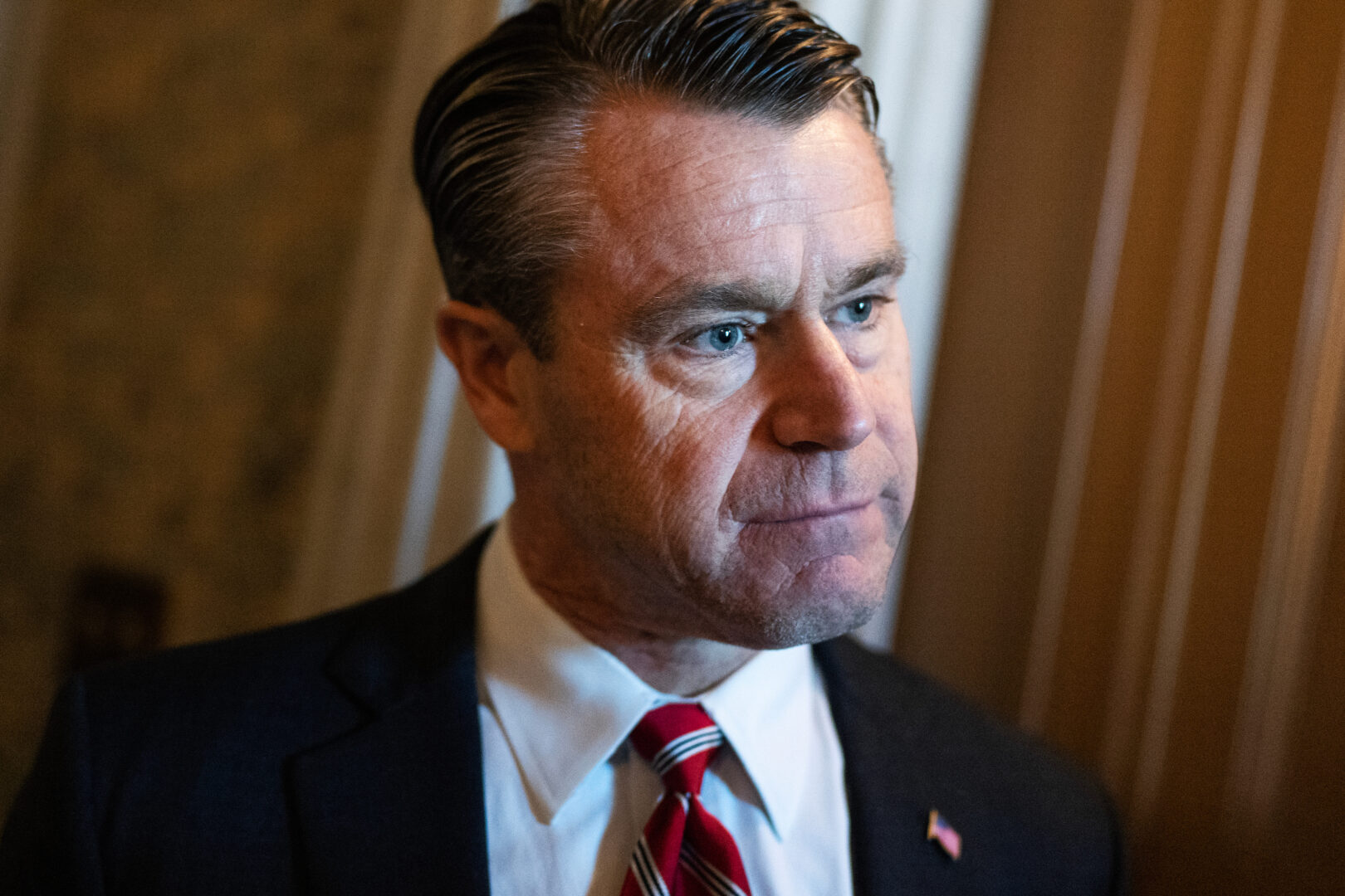 Sen. Todd Young, R-Ind., is seen in the Capitol before Senate votes on April 23. 