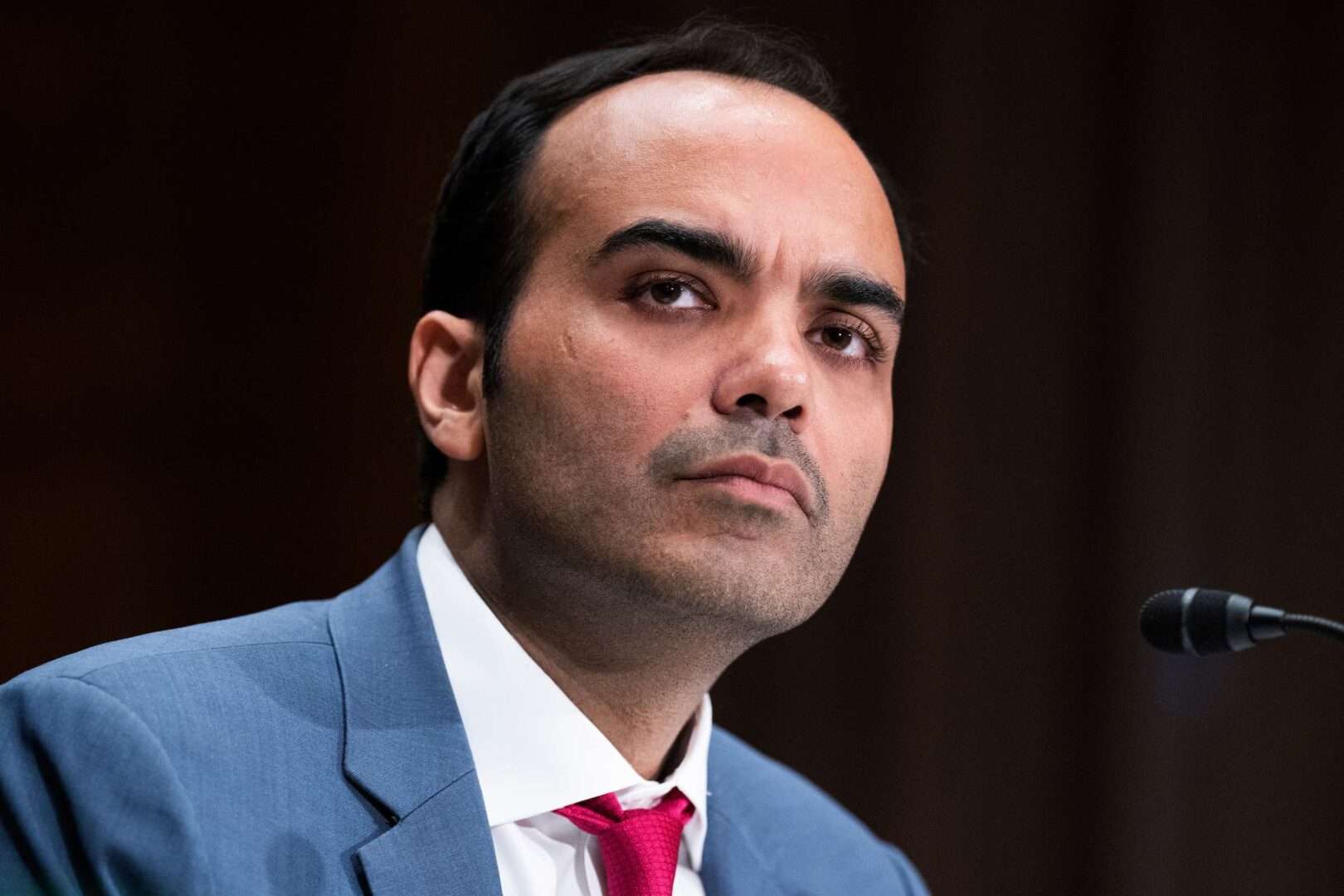 Rohit Chopra, director of the Consumer Financial Protection Bureau, testifies before Congress in 2022.