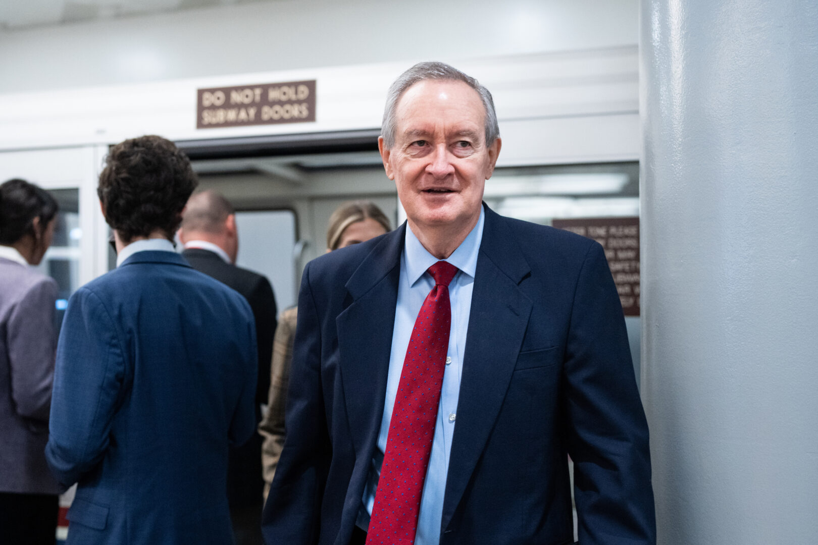 Sen. Michael D. Crapo, R-Idaho, arrives on the Senate subway for a vote on Wednesday.