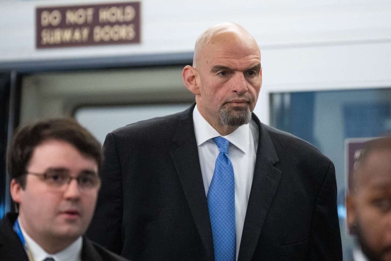 Sen. John Fetterman arrives at the Capitol on Tuesday for a Senate classified briefing on unidentified objects shot down by the U.S. military over Alaska, Canada and Lake Huron.