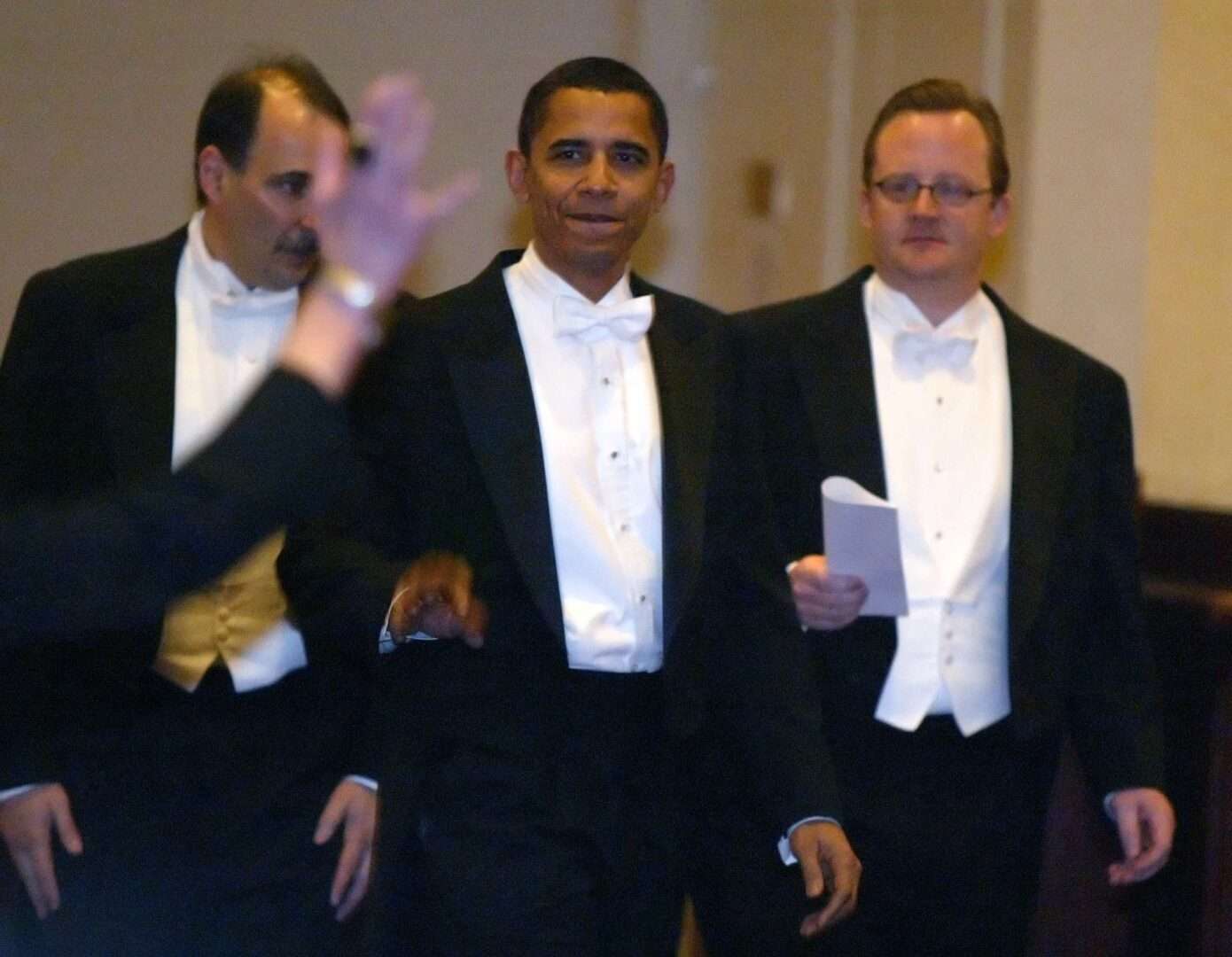 Then-Sen. Barack Obama, center, arrives at the 2006 Gridiron Dinner in Washington with David Axelrod, left, and Robert Gibbs.