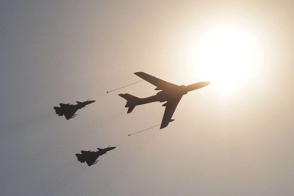 Military airplanes fly over Beijing during a military parade at Tiananmen Square on Oct. 1, 2019, to mark the 70th anniversary of the founding of the People's Republic of China.