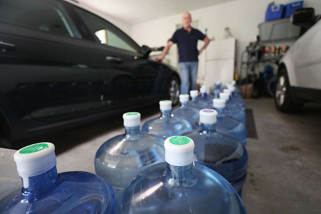 A resident of Westminster, Mass., shown in June, is among 200 local families that have had some of the highest PFAS levels detected in their drinking water and had to rely on bottled water. 