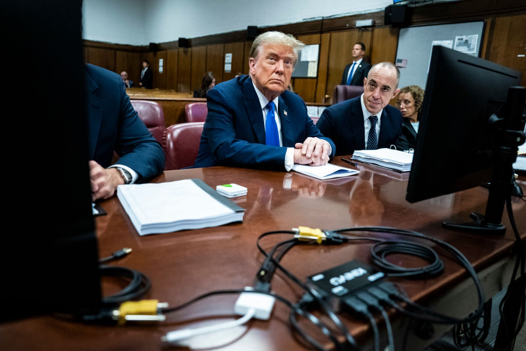 Former President Donald Trump at his criminal hush money trial with his legal team in Manhattan. 