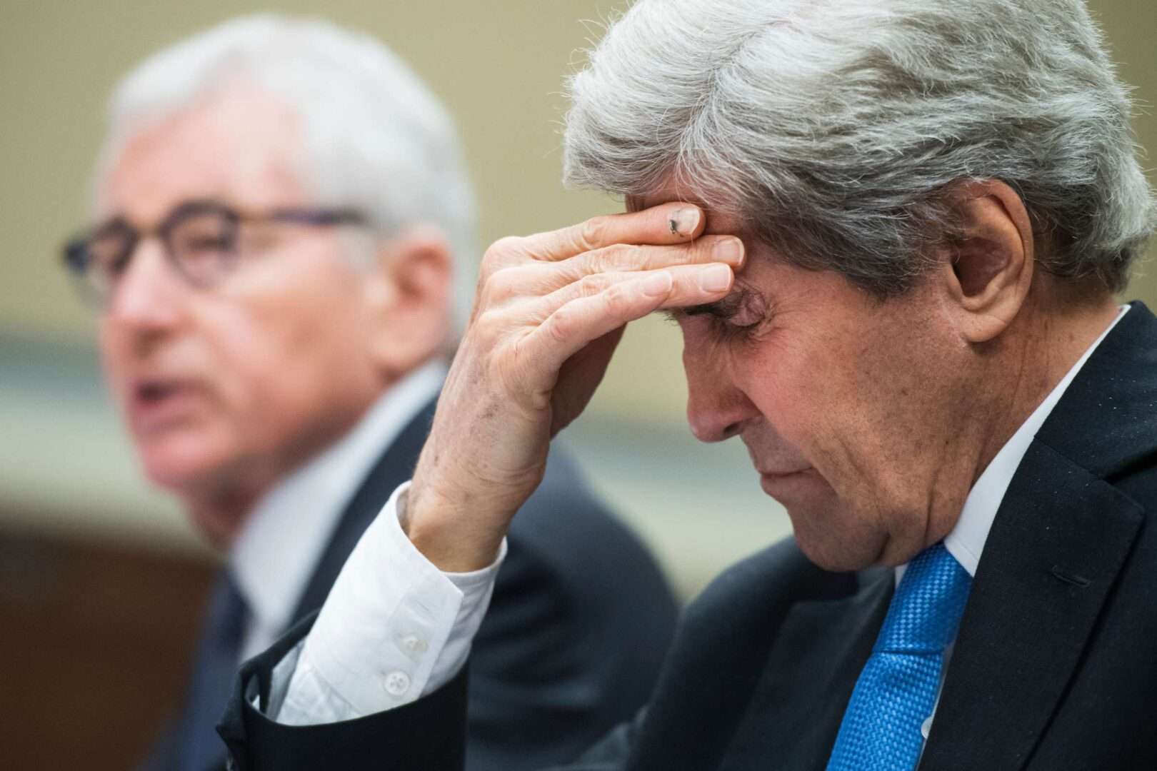 John Kerry, right, the special envoy for climate change, would see his office eliminated in the House's draft fiscal 2024 State-Foreign Operations spending bill. 