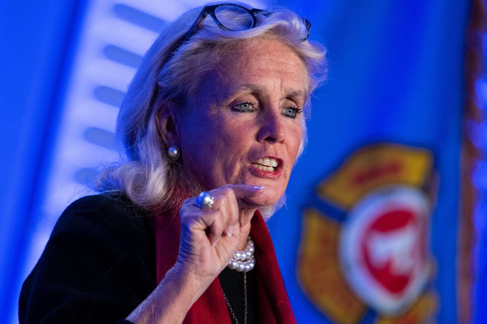 "We have to do both," Rep. Debbie Dingell, D-Mich., said about addressing climate change while protecting worker rights.