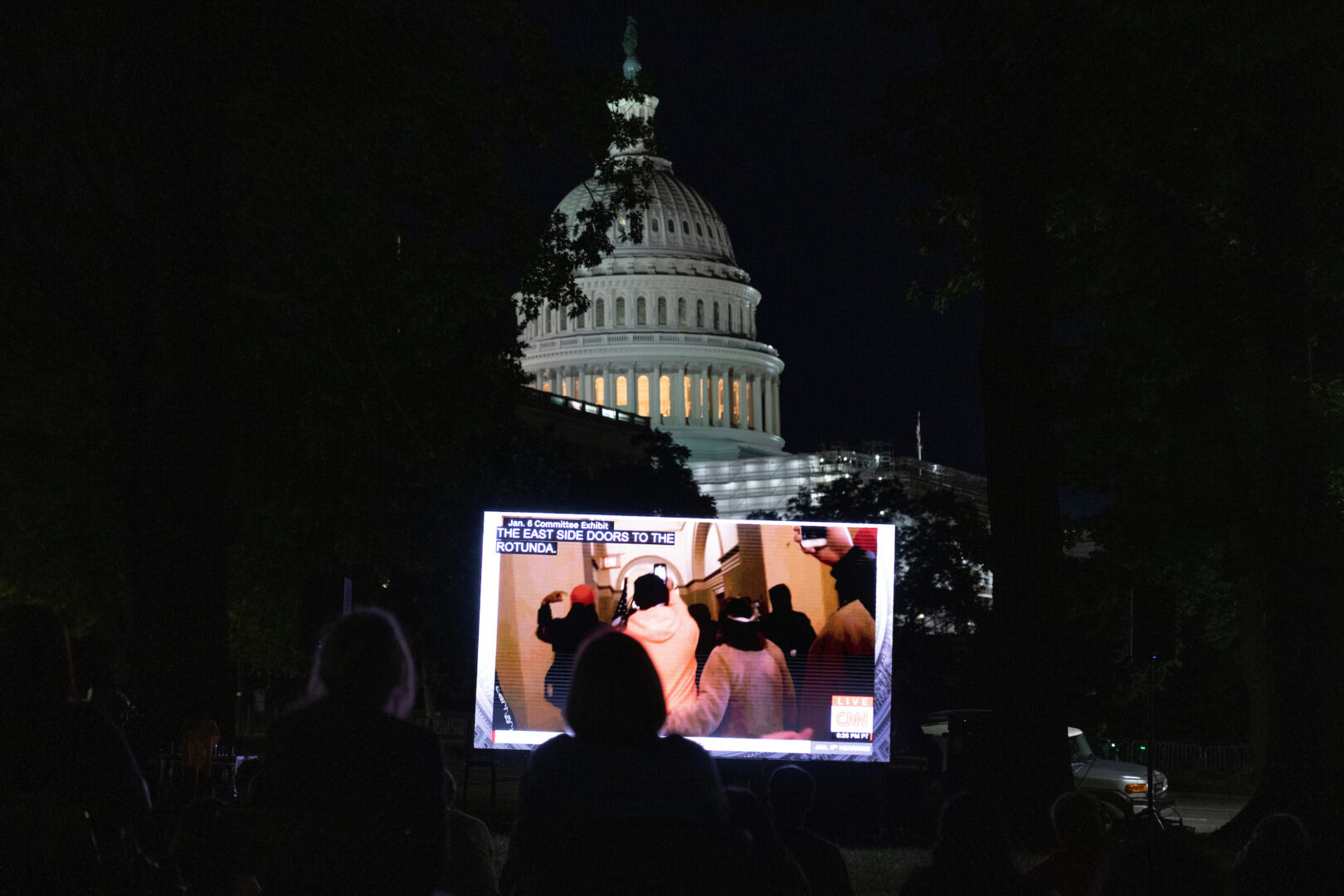 People gather near the Capitol for a watch party of the June 9, 2022, hearing of the Select Committee to Investigate the January 6th Attack on the United States Capitol.