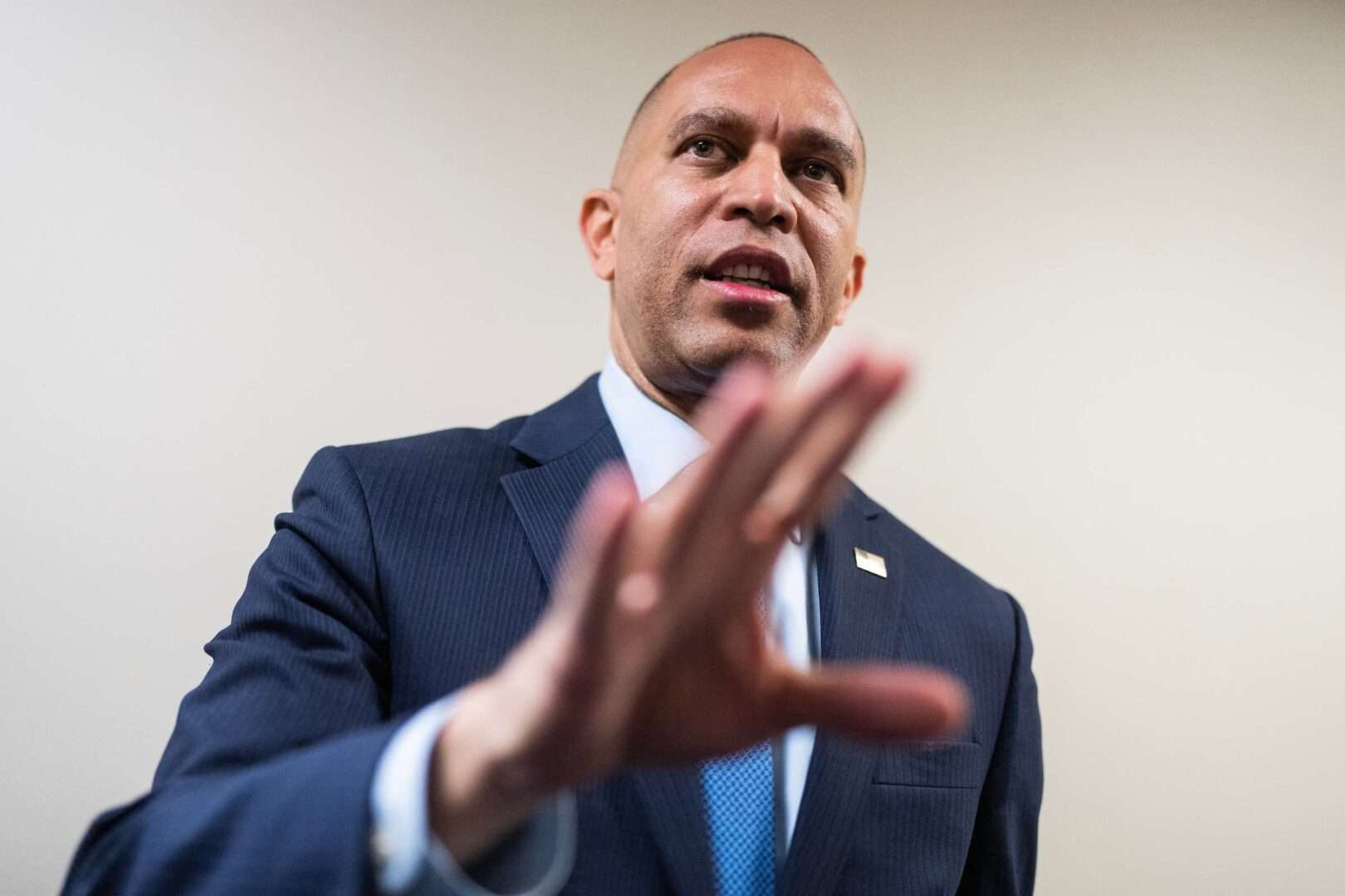 House Minority Leader Hakeem Jeffries, D-N.Y., talks with reporters about the debt ceiling negotiations in the Capitol Visitor Center on Tuesday.