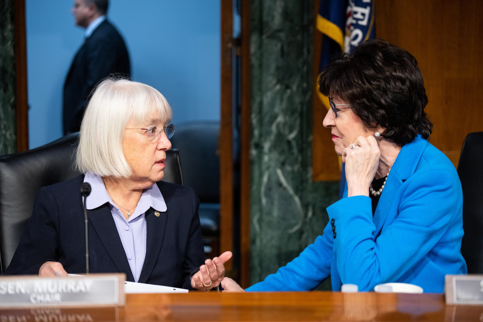 Senate Appropriations Chair  Patty Murray, D-Wash., left, speaks with ranking member Susan Collins, R-Maine, before an Oct. 31 panel hearing.