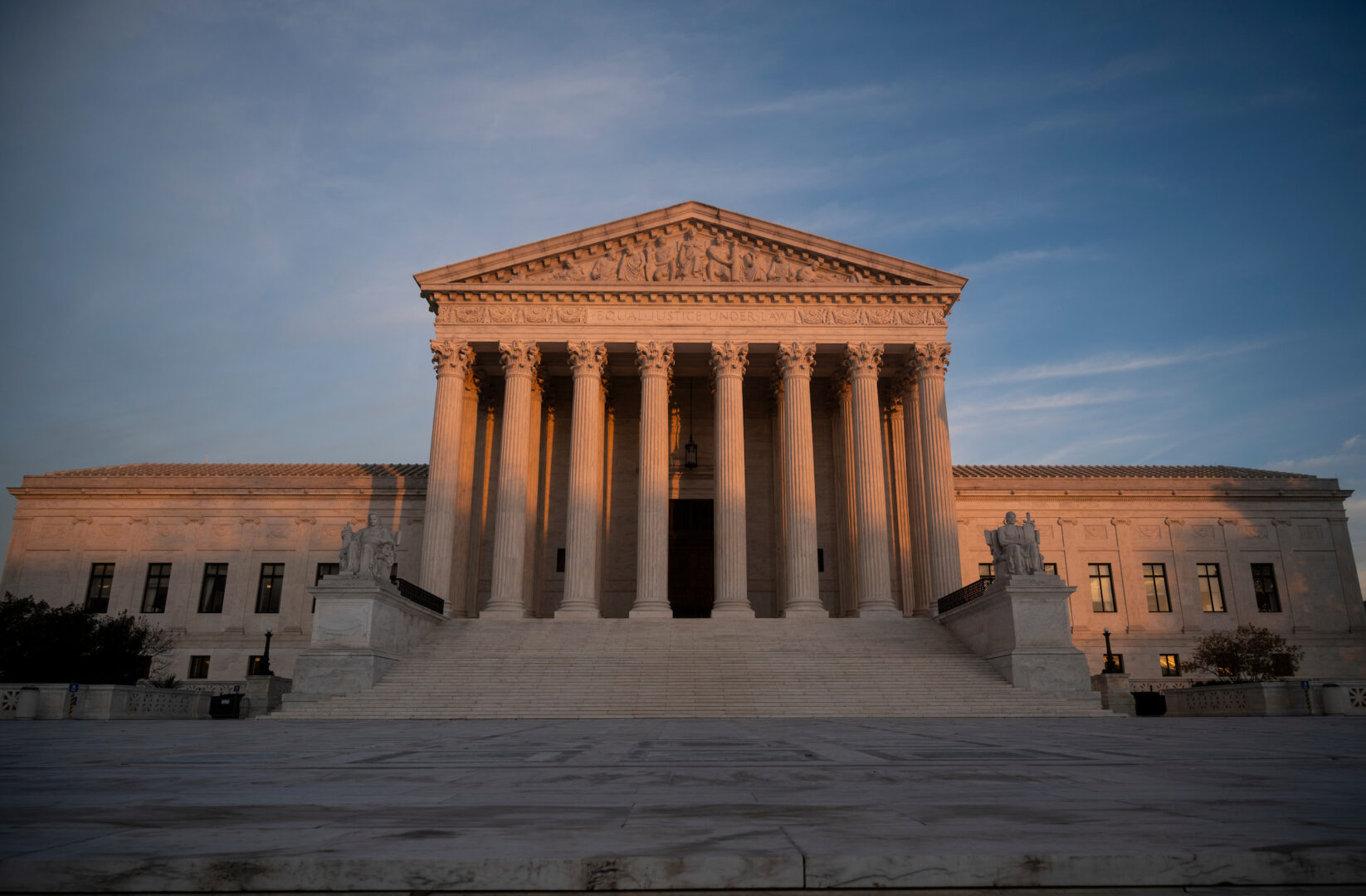 The Supreme Court building is seen at sunset in Washington.  