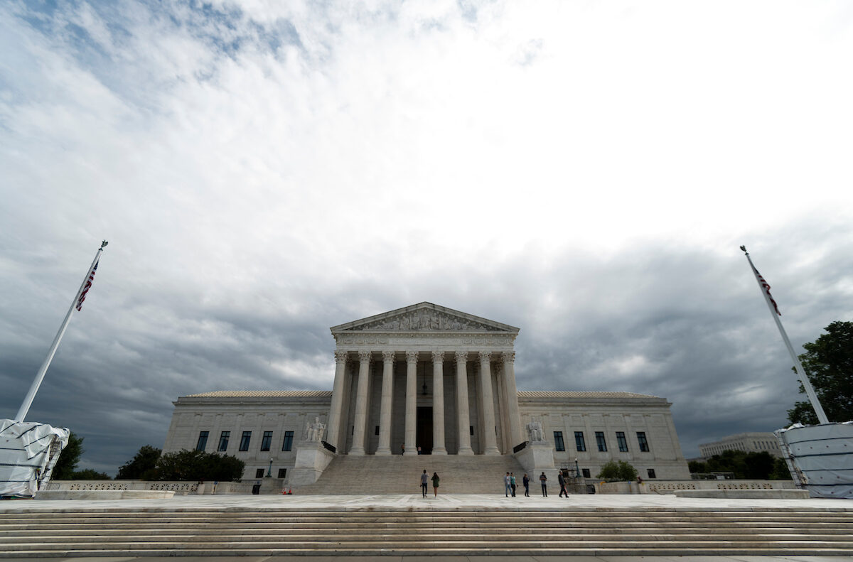 Storm clouds hang over the Supreme Court building. (Bill Clark/CQ Roll Call)