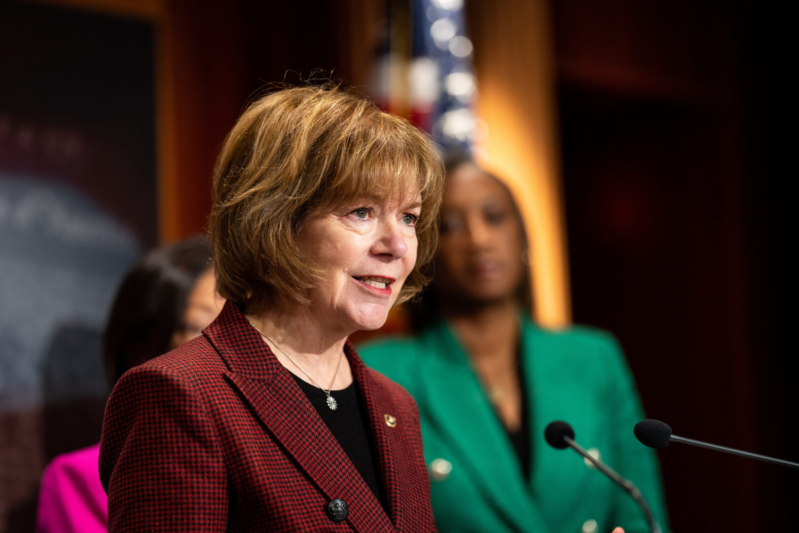 Sen. Tina Smith, D-Minn., speaks at a news conference on abortion rights on Nov. 1, 2023. 