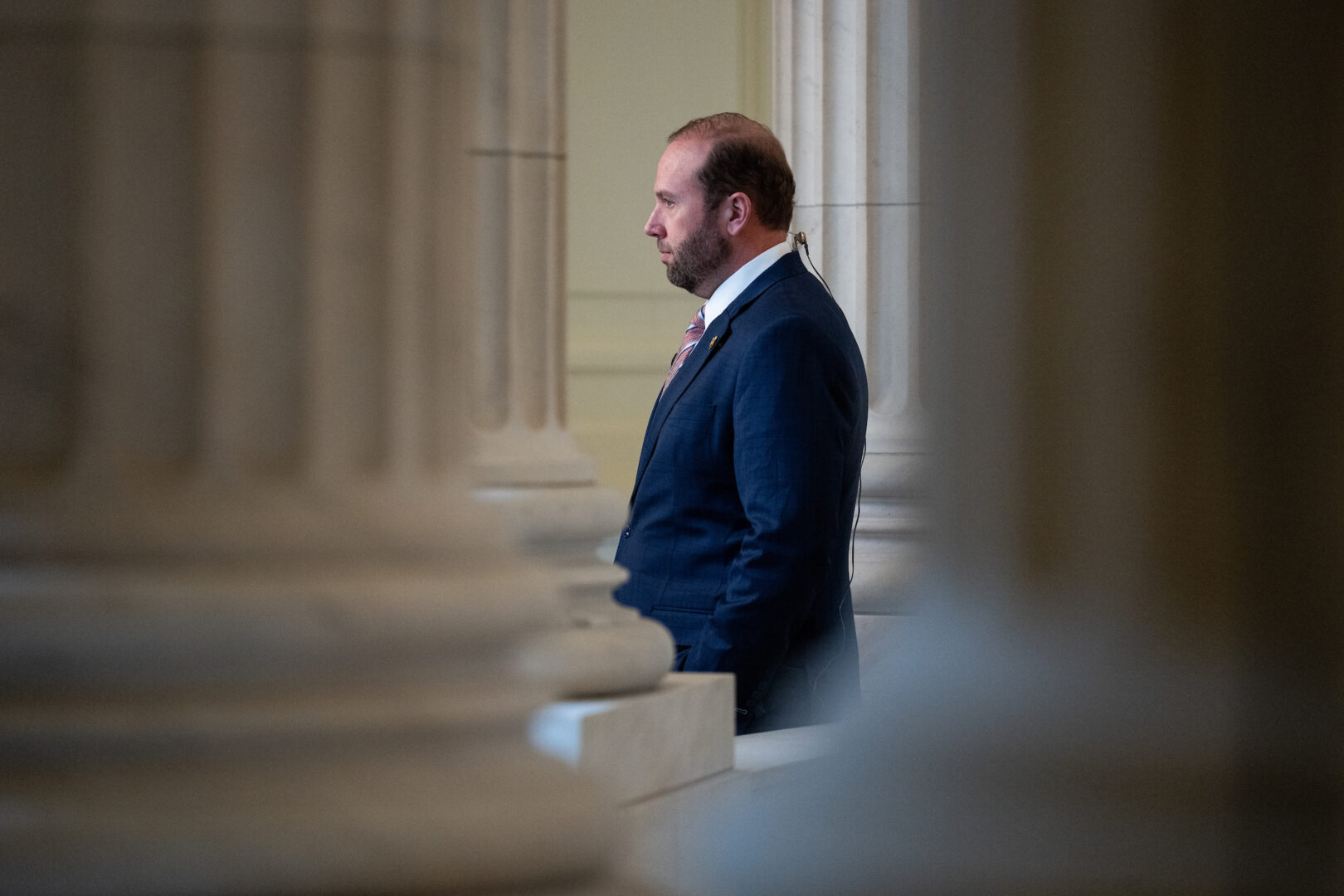 Passage marks a victory for Ways and Means Chairman Jason Smith, R-Mo., who is seen waiting to do a television interview in the Cannon House Office Building on Tuesday. 