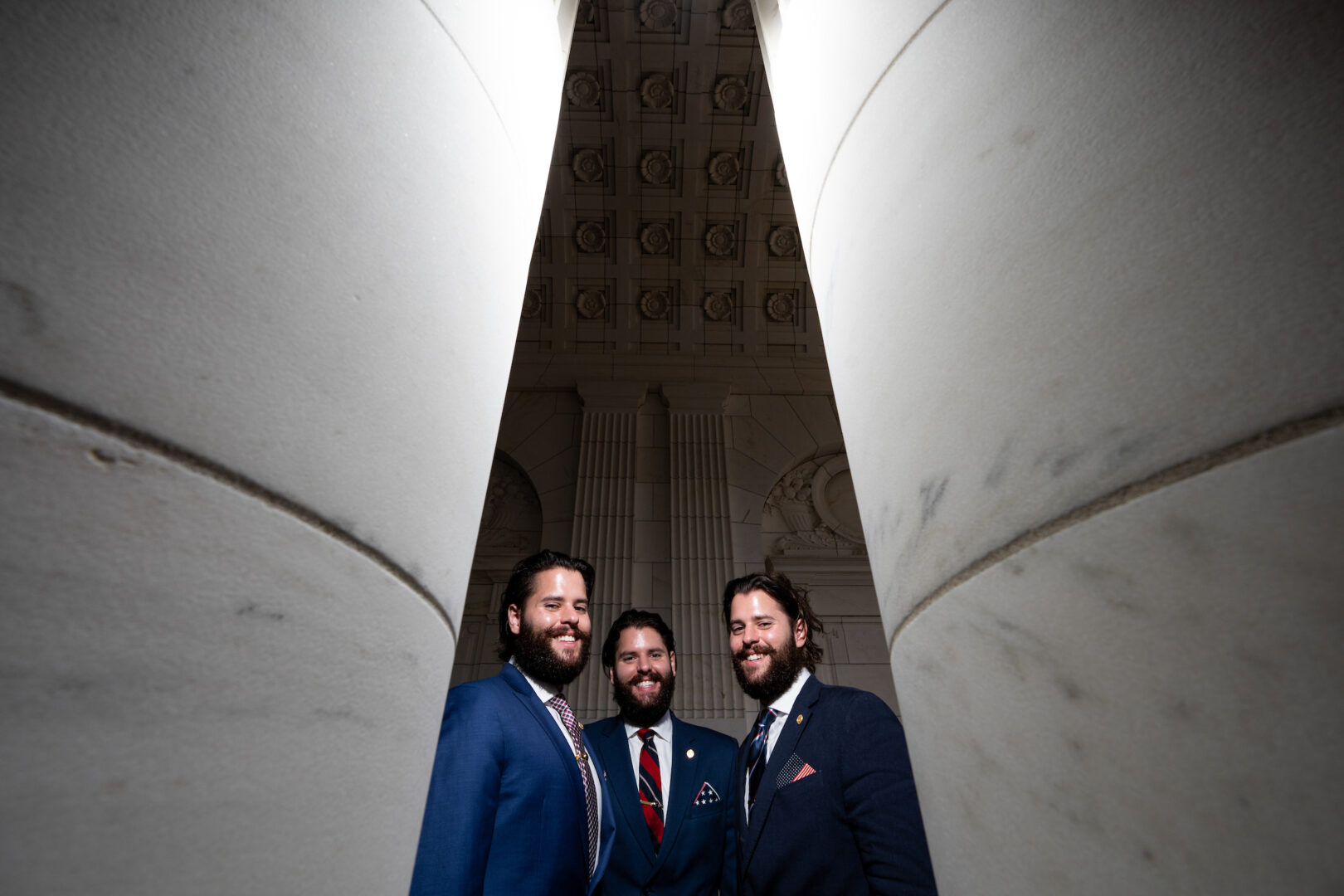 Benjamin, Zachary and Nicholas Osborne pose outside the Russell Senate Office Building on Oct. 16. “Self-interested” politicians could learn a thing or two from triplets, they say.