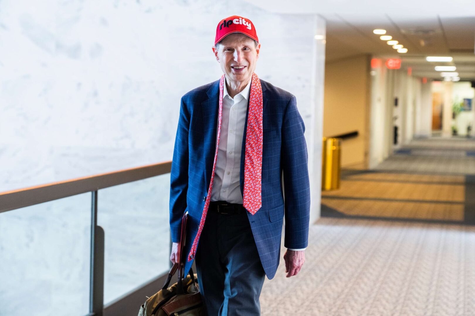 Sen. Ron Wyden, D-Ore., dons a Portland Trail Blazers themed “Rip City” hat in the Hart Building on Thursday, Aug. 4. 