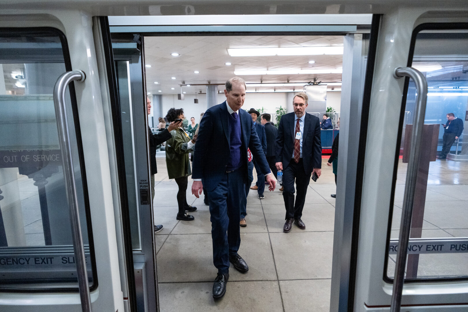 Sen. Ron Wyden, D-Ore., enters the Senate subway after speaking with reporters in the Capitol on Wednesday, Jan. 10. 